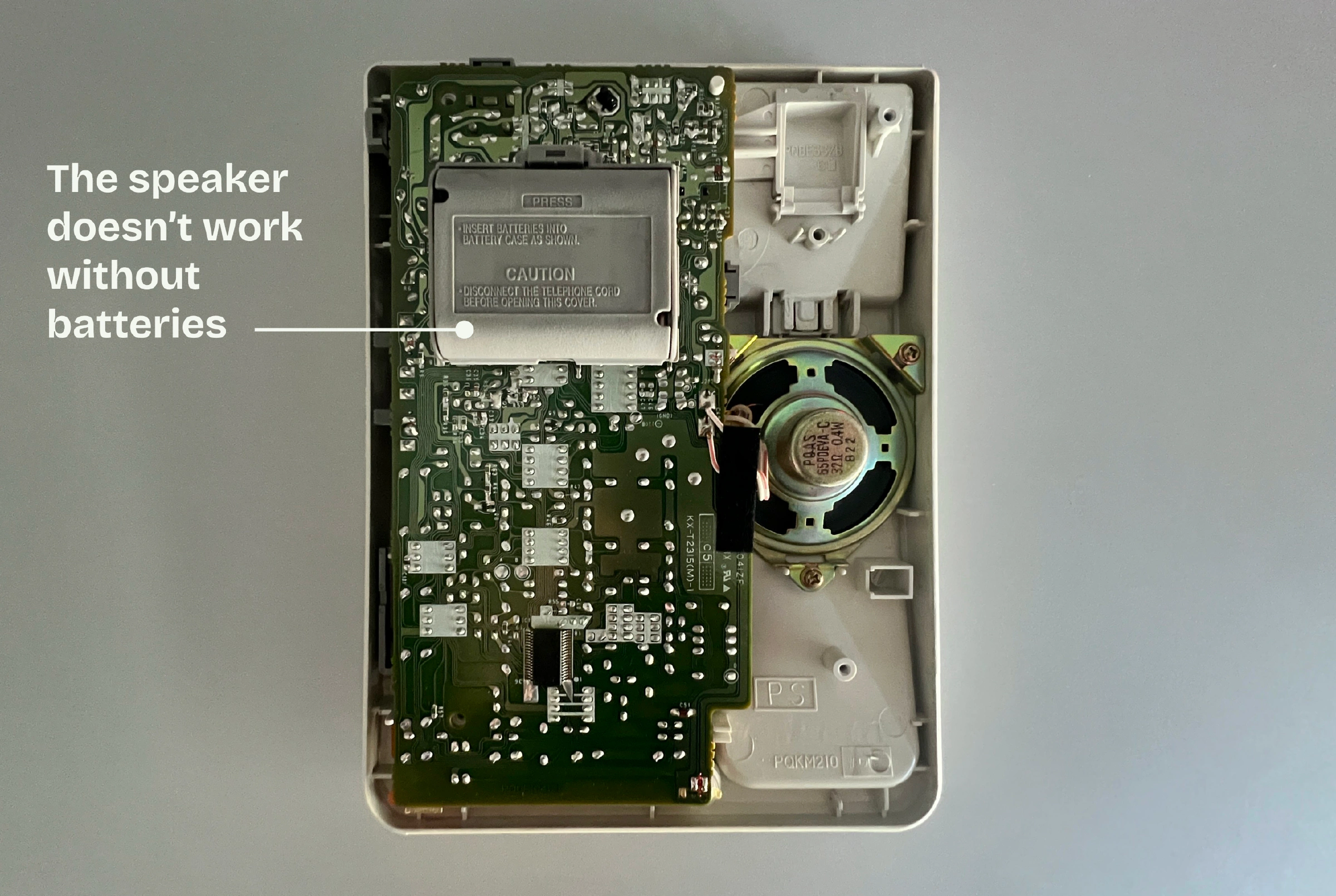 Panasonic phone restoration step showing cleaned plastic components