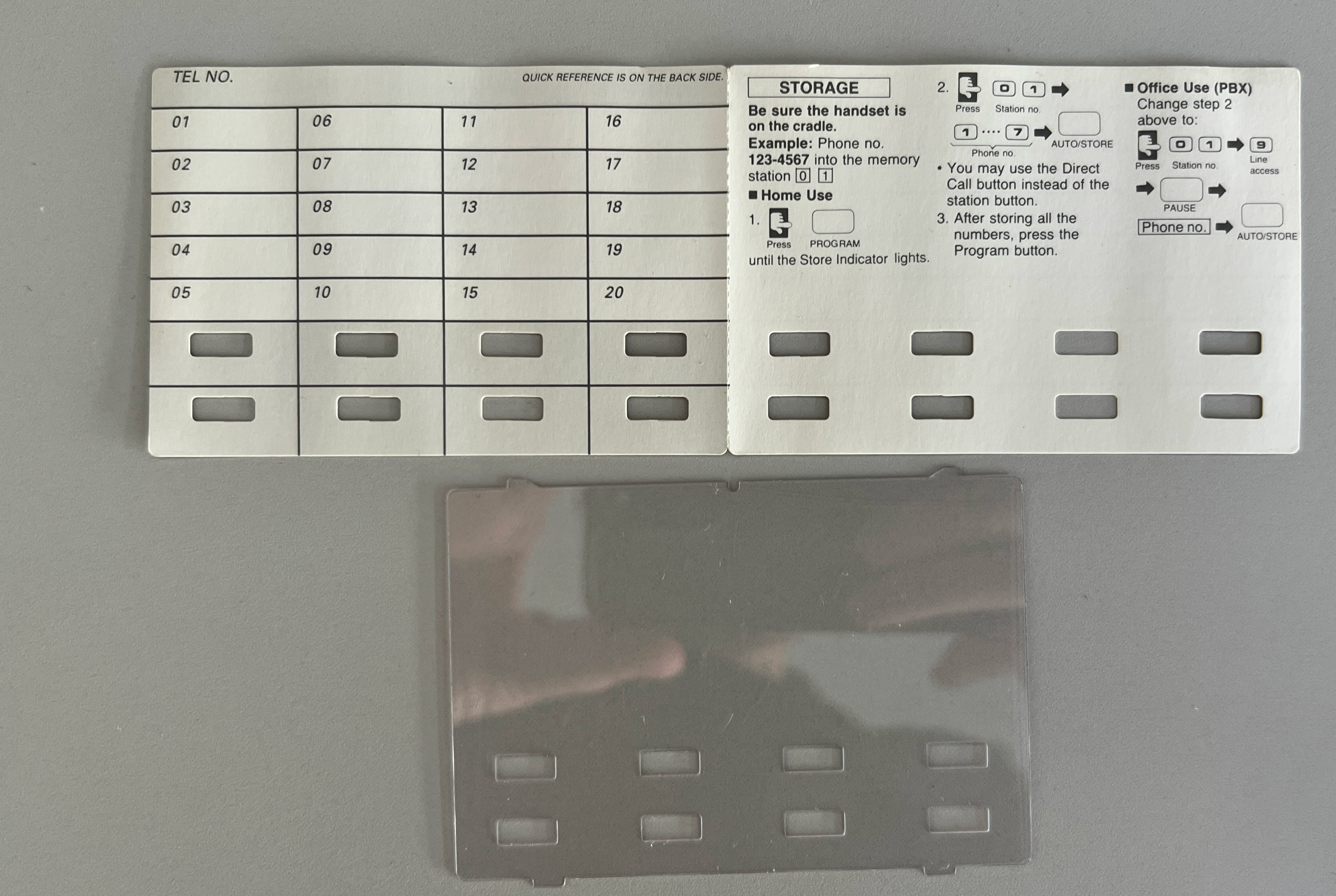 Panasonic phone with flipped label card showing fresh white surface