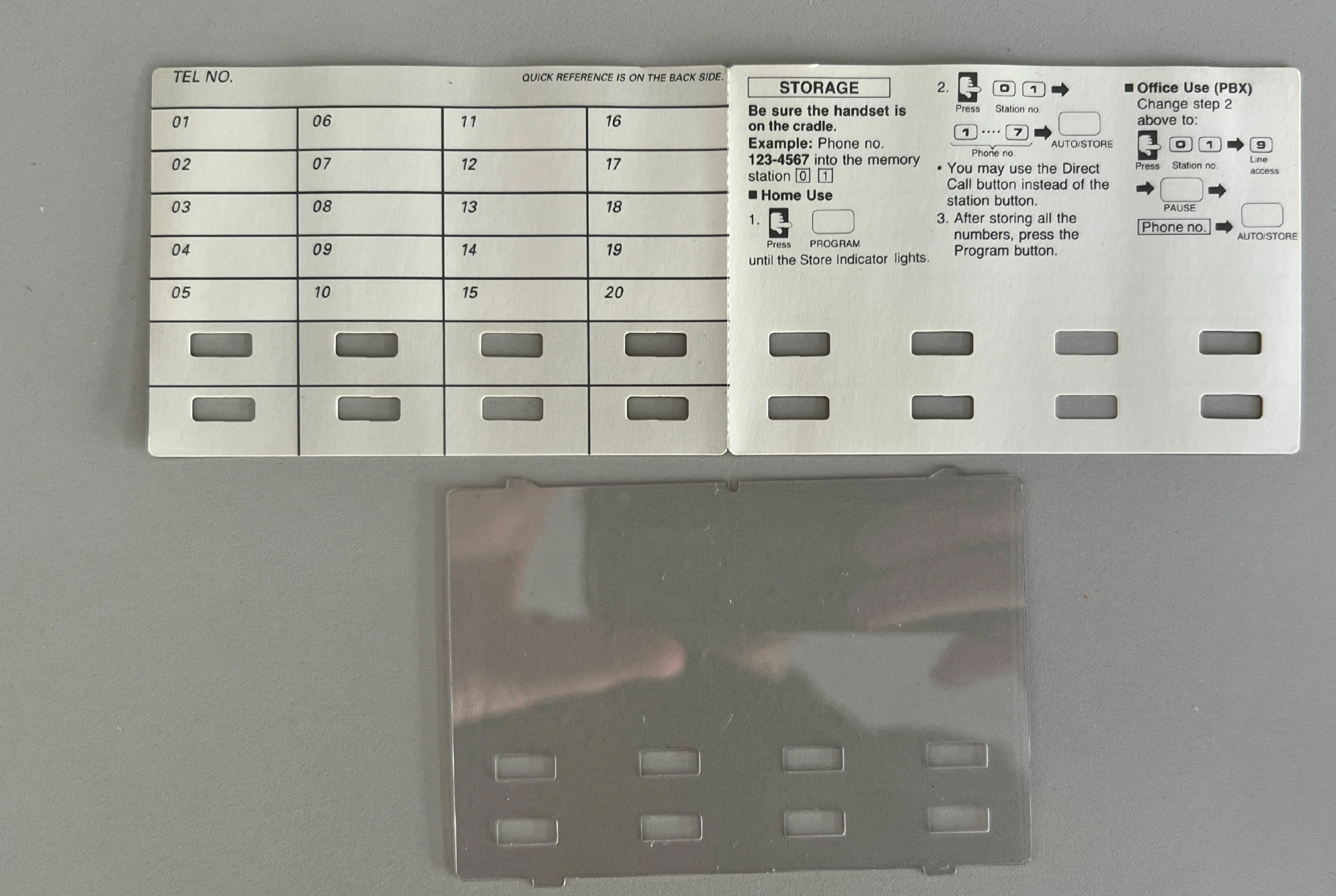 Panasonic phone with flipped label card showing fresh white surface