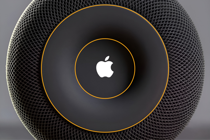 Apple HomePod top with orange circular guides around the speaker surface and Apple logo